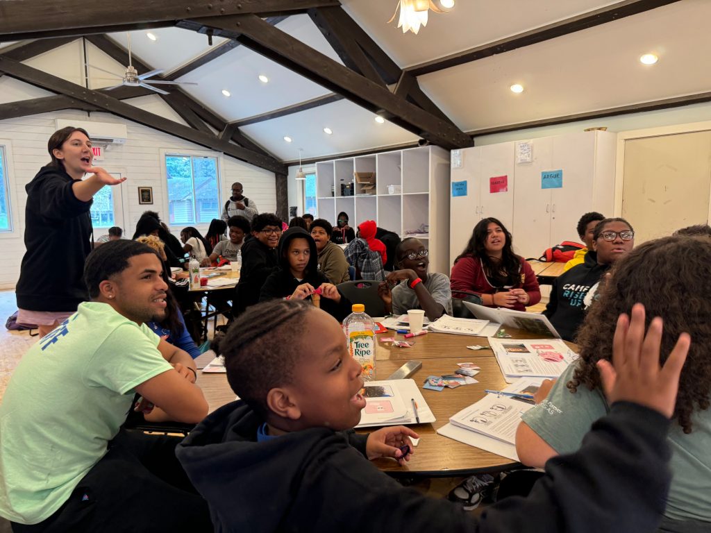 Teens participate in a group activity at Camp Rise Up